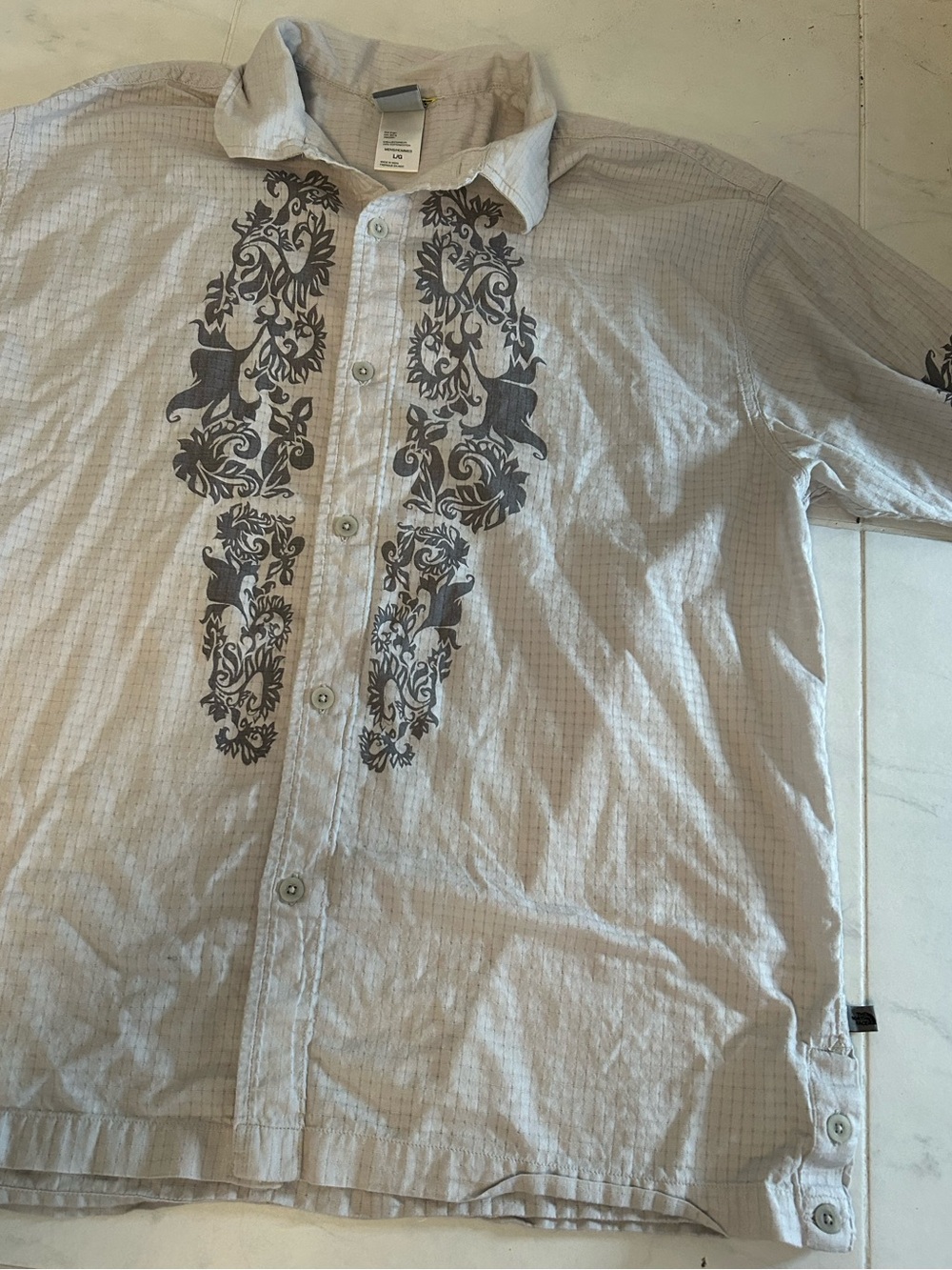 The North Face Gray button down shirt with accents.   Lightweight. Cotton EUC.